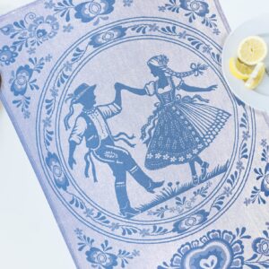 Blue Czech folk tea towel featuring a traditionally dressed dancing couple surrounded by woven floral patterns.